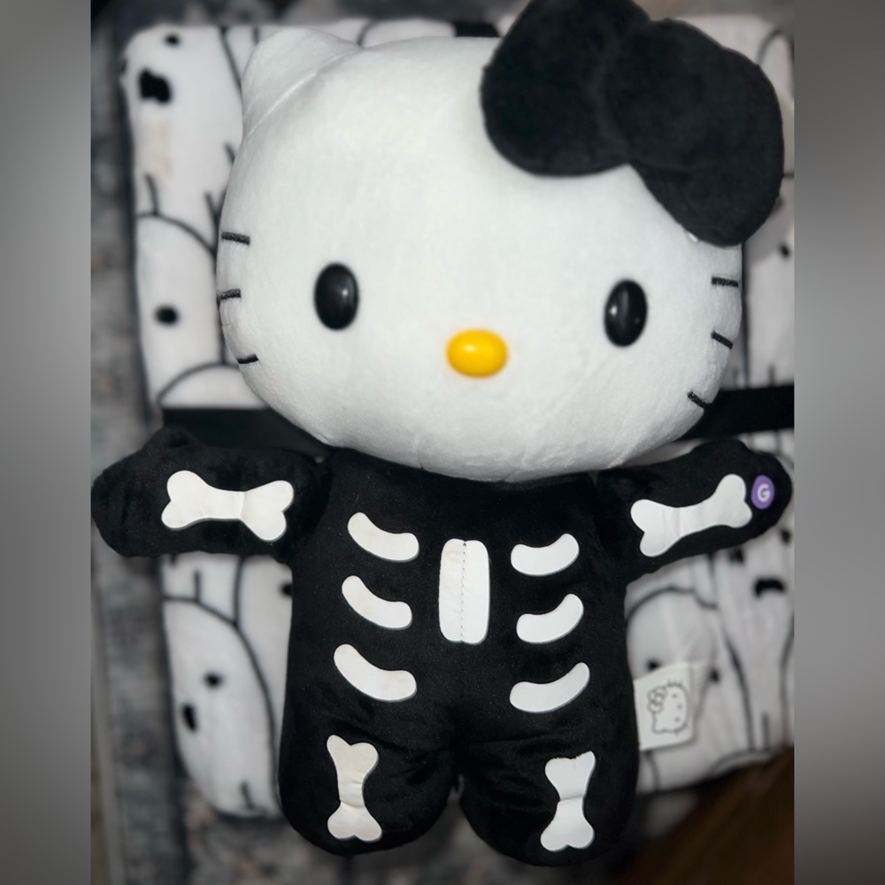 Hello Kitty Musical Dancing Halloween Skeleton Side Stepper
